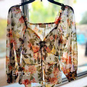 Floral top with rouge tie and drop waist